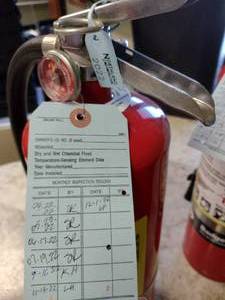 lot 488 image: 10 lb. ABC Badger Fire Extinguisher.