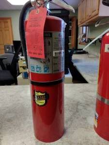 lot 489 image: 10 lb. ABC Buckeye Fire Extinguisher.