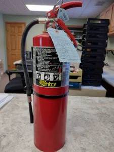 lot 490 image: 10 lb. ABC Sentry  Fire Extinguisher.
