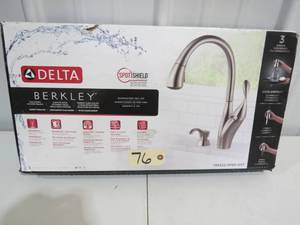 lot 76 image: Delta Berkley Single Handle Pull-Down Kitchen Faucet With MagnaTite And Soap Dispenser In Spotshield Stainless Used