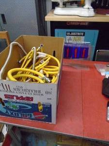 Box of 10 - 12 flex gas lines some with brass fittings. As shown.