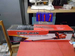 New Toolman 20 volt 20 cordless hedge trimmer. Was a trade show display. With battery & charger. As shown.