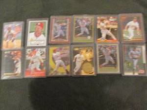 12 Assorted Mark McGwire Cards-doub...