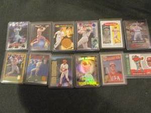 12 Assorted Mark McGwire Cards-doub...