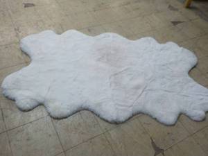 White Rug- was returned 72 x 45...