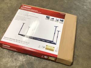 lot 17 image: Husky Adjustable Height Overhead Ceiling Mount Garage Rack in Black (42 in. H x 96 in. W x 32 in. D