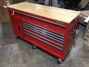 lot 18 image: Husky 61 in. W x 22.1 in D Standard Duty 7-Drawer 1-Door Mobile Workbench Tool Chest with Solid Wood Top in Gloss Red review pictures