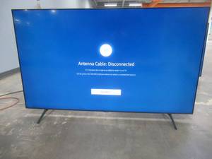 lot 4 image: Samsung - 65 Class 7 Series LED 4K UHD Smart Tizen TV ModelUN65TU7000FXZA (SMALL SCRATCH IN THE UPPER LEFT CORNER)