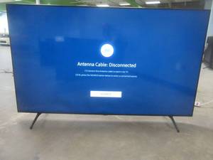 lot 30 image: SAMSUNG UN75TU7000 75 inches 4K Ultra HD Smart LED TV (SHADE SPOTS AT BOTTOM, SEE PHOTOS)