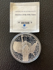 lot 15 image: Commemorative Coin