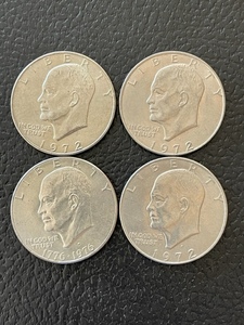 lot 20 image: 4 Eisenhower Dollars