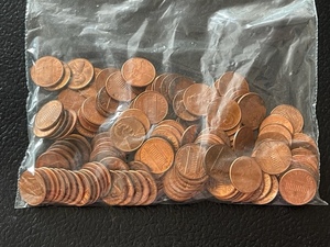 lot 38 image: Bag of Uncirculated Pennies