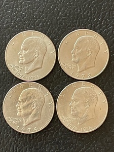 lot 61 image: 4 Eisenhower Dollars