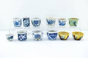 lot 70 image: 12 Large Group of Asian or Chinese CupsVasesPlanters