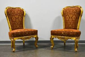 lot 160 image: Pair of Gilt Wood Chairs with Sienna Colored Upholstery