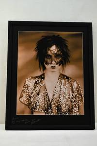 lot 126 image: Photograph of Masked Woman Inscribed to Horst Rechelbacher