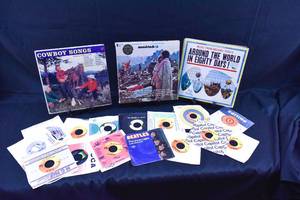 lot 312 image: Group of 3 LPs and 15 45s The Beatles, Beach Boys, Woodstock, The Who