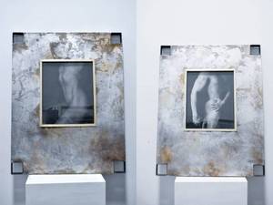 lot 295 image: Pair of Industrial Mapplethorpe-like Framed Photographs of Nude Figures by Lydia Cutter, Cappagi