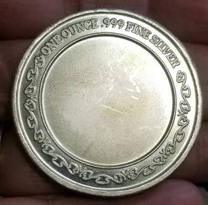 1 TROY OZ .999 FINE SILVER LION ROUND