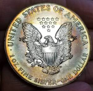1987 AMERICAN SILVER EAGLE WITH AMAZING TONING