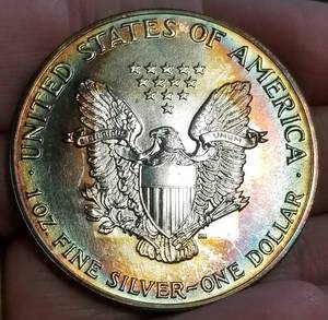 1988 AMERICAN SILVER EAGLE WITH AMAZING TONING