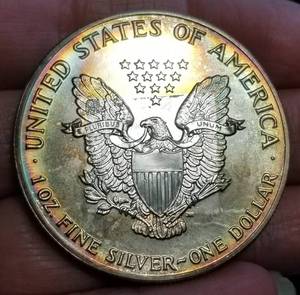 1990 AMERICAN SILVER EAGLE WITH AMAZING TONING