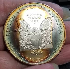 2003 AMERICAN SILVER EAGLE WITH AMAZING ALBUM TONING