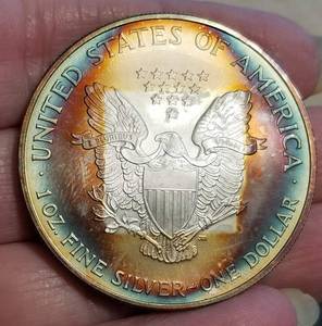 2006 AMERICAN SILVER EAGLE WITH NICE ALBUM TONING