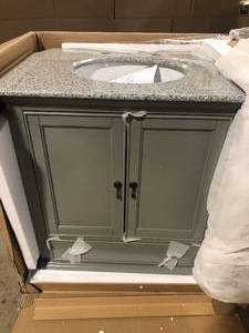lot 19 image: Home Decorators Collection Newport 31 in. W x 21-12 in. D Bath Vanity in Pewter with Granite Vanity Top in Gray damaged corner see pictures