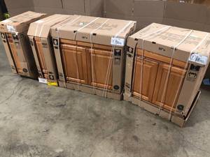 lot 31 image: Lot of Assorted Kitchen Cabinets wood color Customer Returns See Pictures
