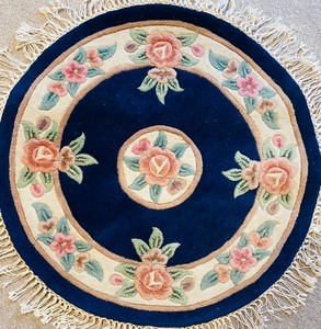 Petite Circular Rug with Floral Accents