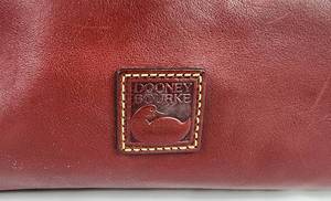 lot 1 image: Classic Dooney & Bourke Handbag