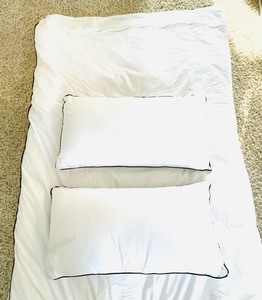 lot 77 image: High End Down Comforter with 2 King Pillows with Black Piping