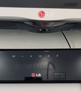 lot 57 image: LG 55 Inch TV with LG Sound Bar and Subwoofer