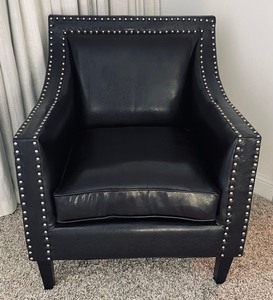 lot 35 image: Sophisticated Black Leather Chair with Silver Rivet Accents