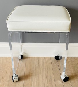 lot 33 image: Lucite Padded Stool on Casters
