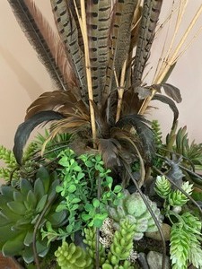 lot 211 image: Faux Greenery and Feather Decor