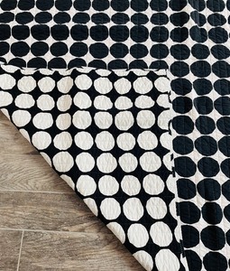 lot 231 image: Marimekko Reversible King Comforter and Two King Pillow Shams