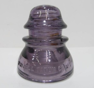 lot 35 image: Whitall-Tatum 16 Amethyst Glass Insulator