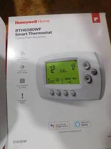 lot 78 image: Honeywell Home Wi-Fi 7-Day Programmable White Thermostat with Wi-Fi Compatibility