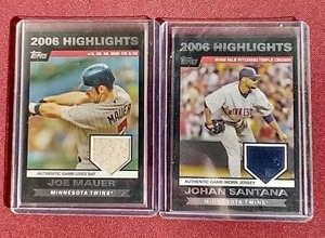lot 49 image: (2) Game-Used Twins Cards - Santana & Mauer
