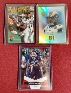 lot 51 image: (3) #d NFL Star Cards - Reggie White, Torry Holt & Marshawn Lynch