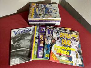 lot 87 image: Huge Lot of Vikings Yearbooks & Magazines