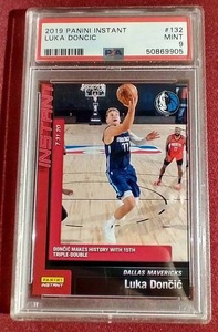 lot 100 image: 2019 Panini Instant Luka Doncic 1 of 794 - PSA 9