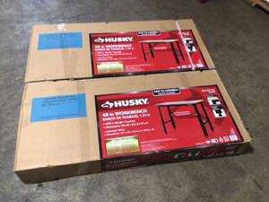 lot 17 image: Husky 4 ft. Solid Wood Top Workbench in Black, Lot of 2, Review all pictures