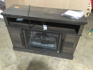 lot 24 image: StyleWell Wolcott 48 in. Freestanding Electric Fireplace TV Stand in Brown Oak, Open Box, Review all pictures