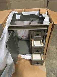 lot 28 image: Home Decorators Collection Naples 24 in. W Bath Vanity Cabinet Only in Distressed Grey with Right Hand Drawers