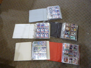 lot 73 image: 5 Binders Full of Baseball and Football Cards
