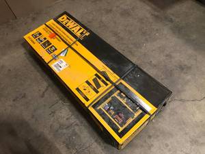 lot 28 image: DEWALT Yellow 2-Shelf Garage Storage Workbench Kit, Open Box, Review all pictures