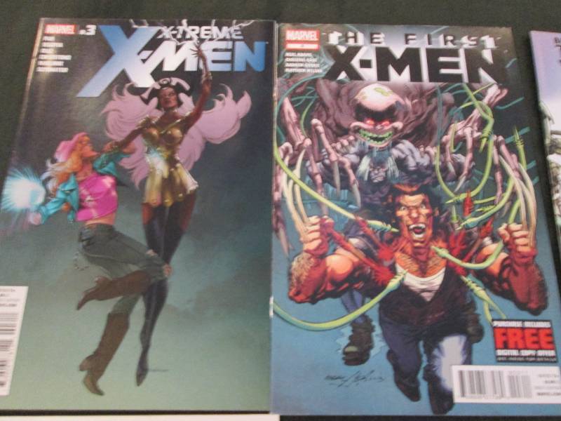 210. 6 XMen Comics Books...